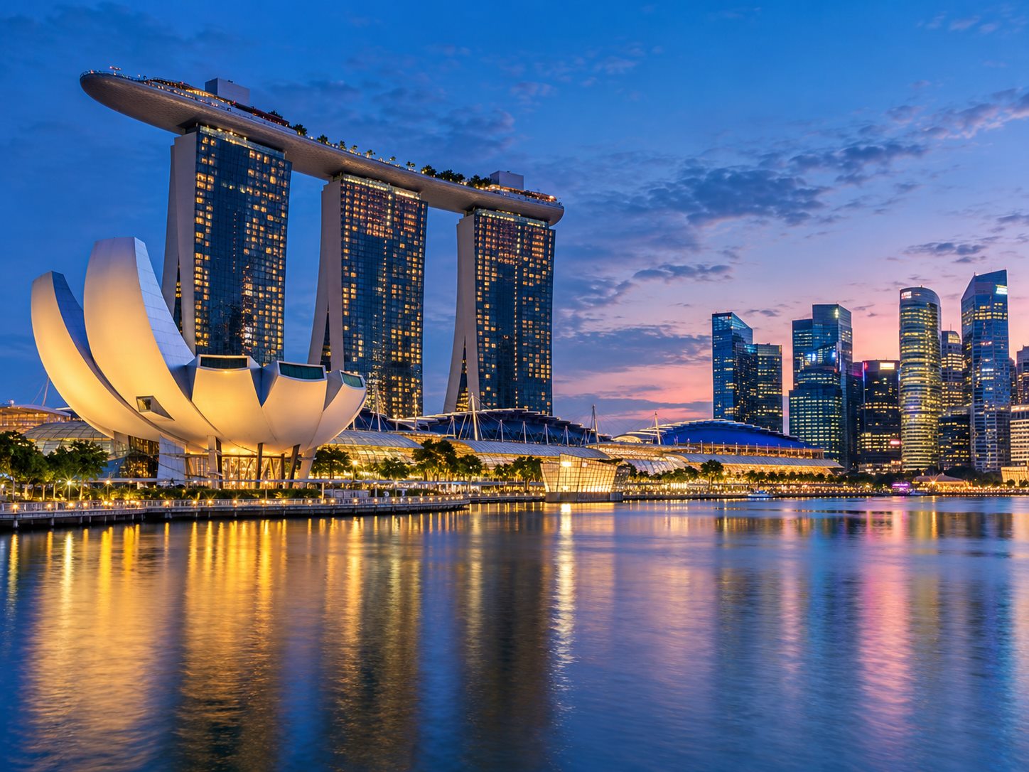 Singapore skyline around Marina Bay at blue hour